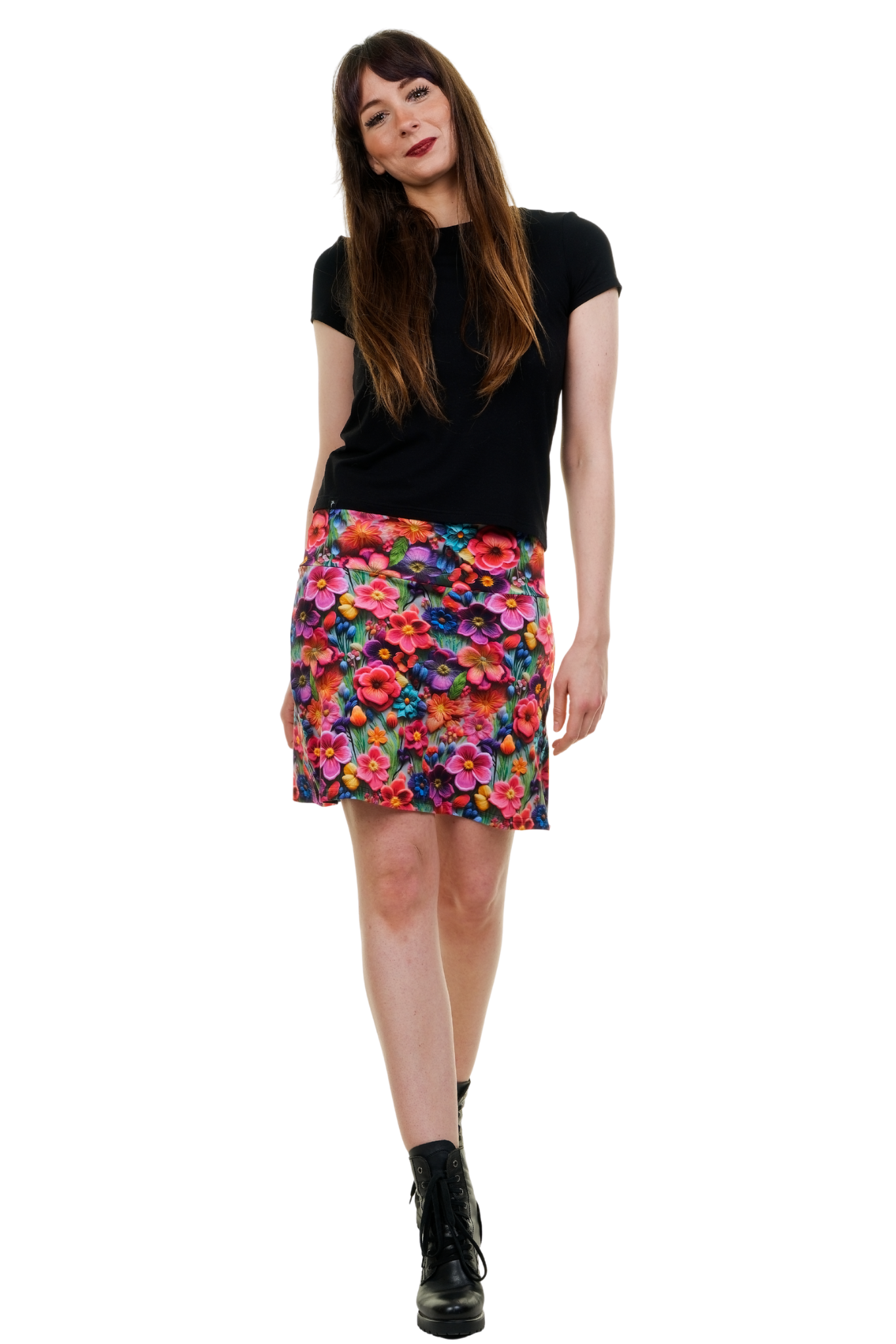 Nahaufnahme des elastischen Jersey-Stoffs des Rocks Blossom Wonderland, die das detailreiche 3D-Blumenmuster in leuchtenden Farben und die feine Webstruktur zeigt.